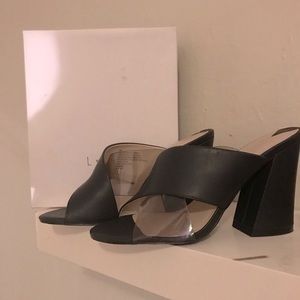 Leather and translucent open toe mules